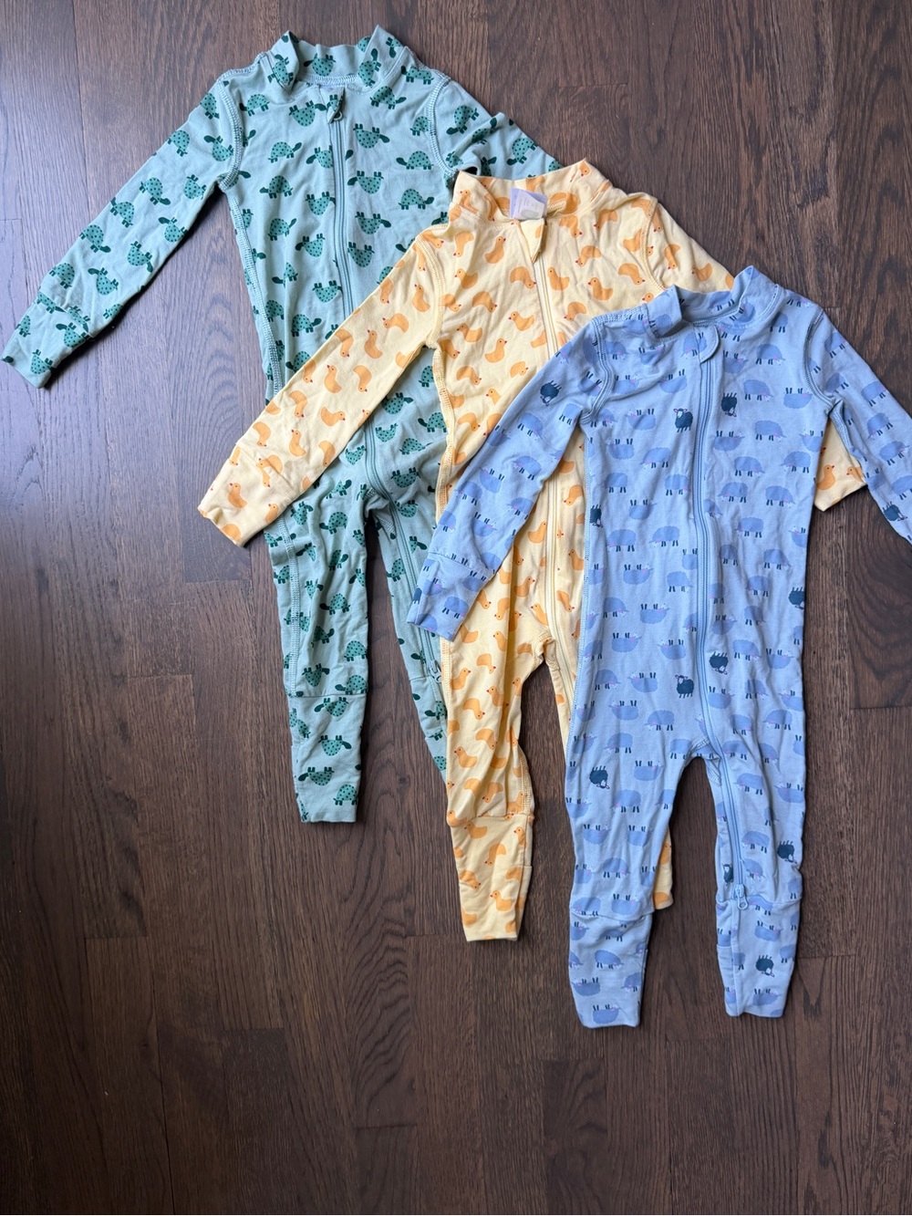 Hanna Andersson Green, Yellow, and Blue Kids One-Piece Footies